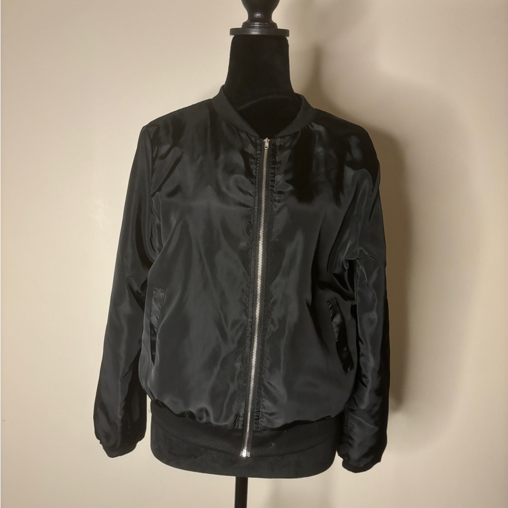 Lightweight black bomber jacket.